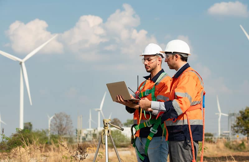 Two workers in a field